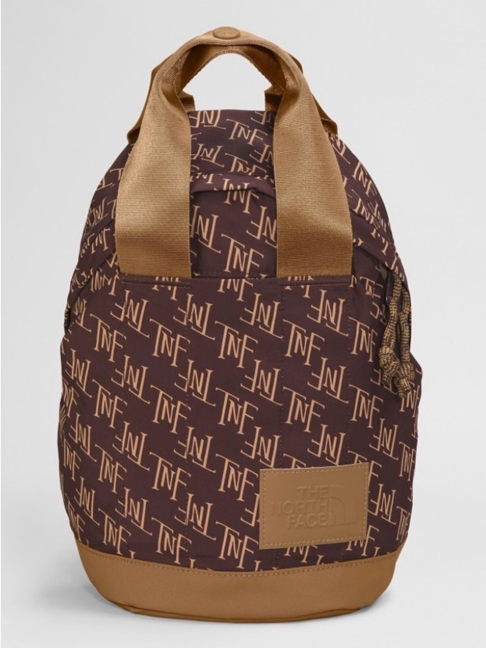 The North Face Women's Never Stop Mini Backpack in coal brown and utility brown